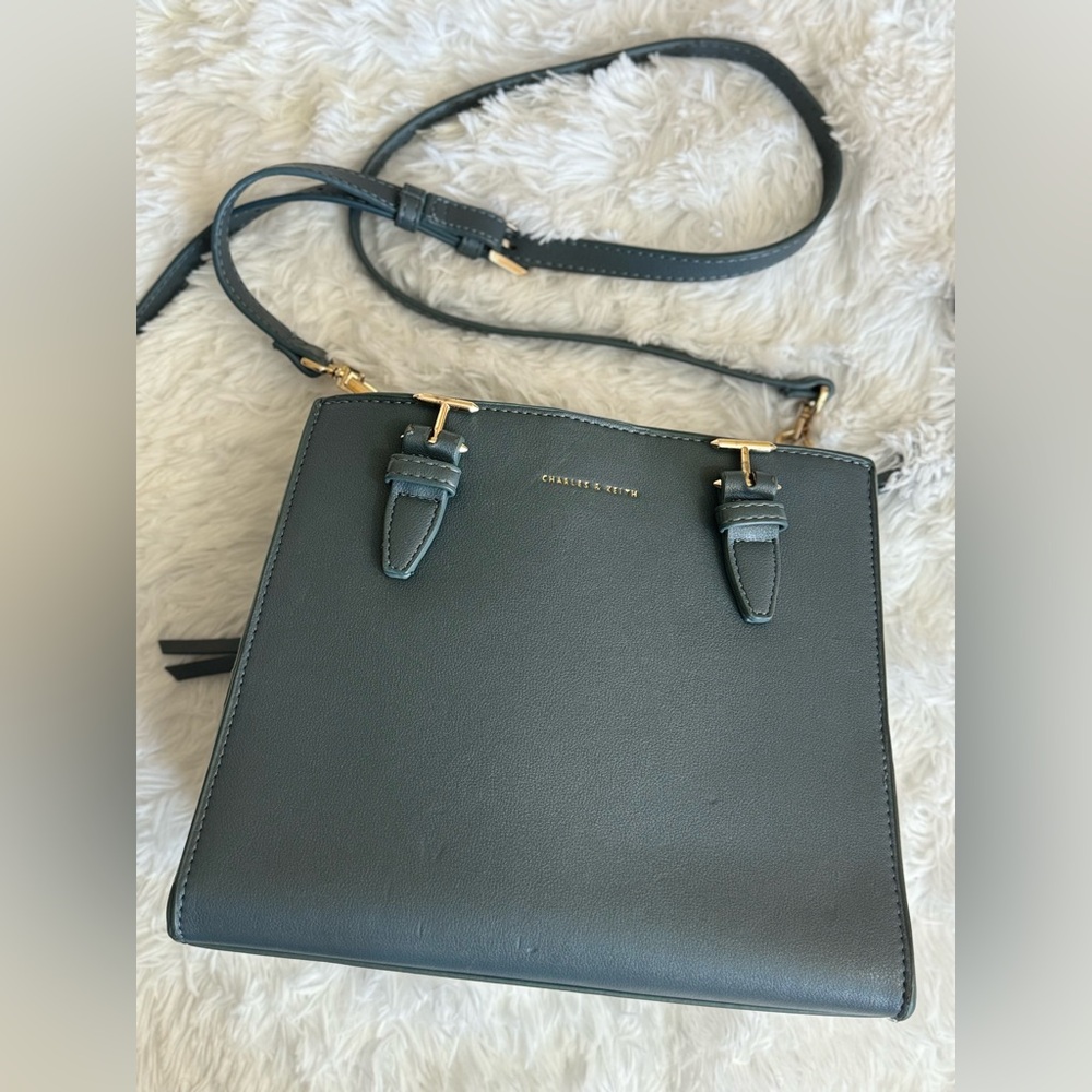 Grey Crossbody Bag with Adjustable Strap and Metallic Accents